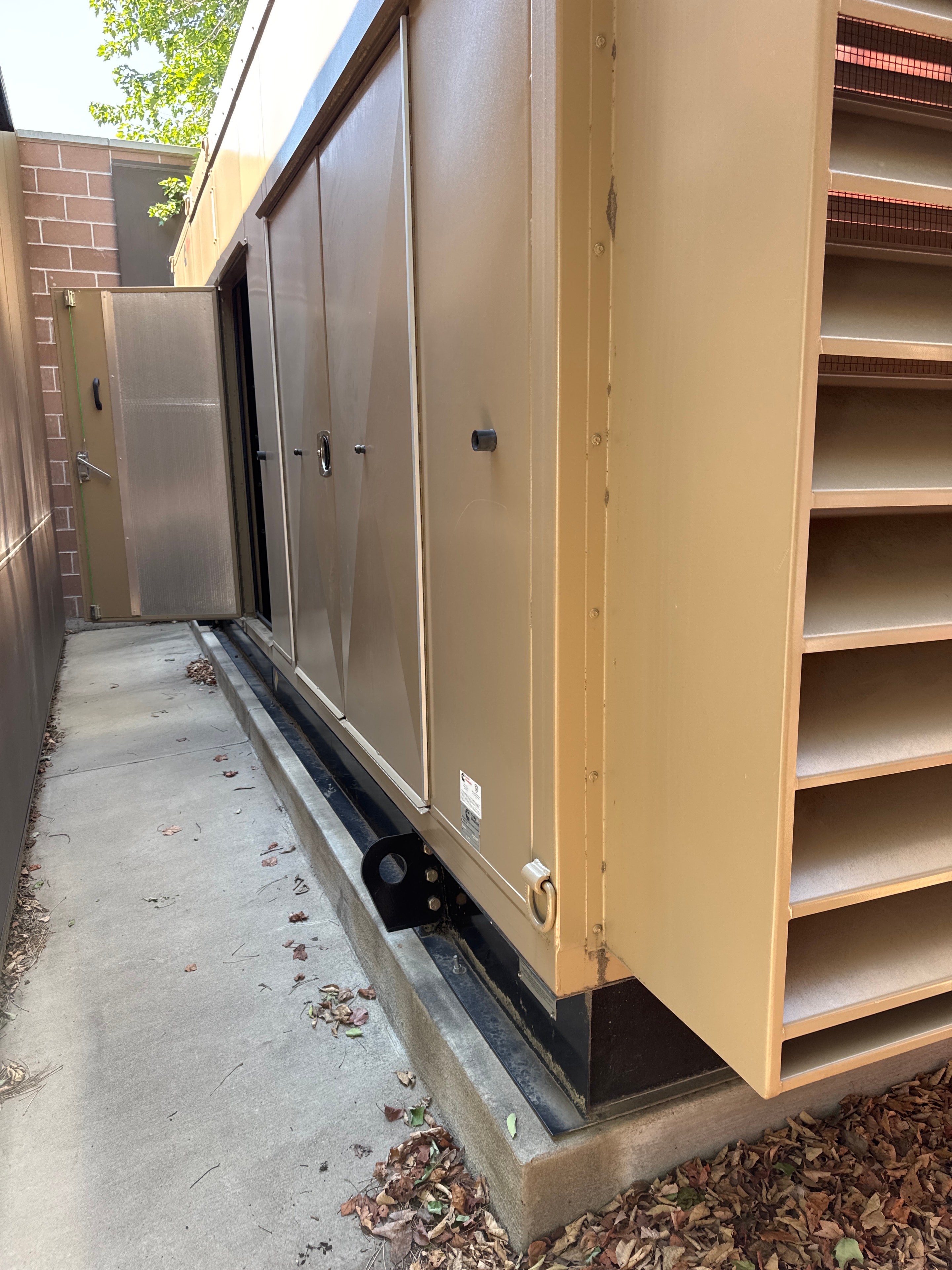 Outdoor enclosed backup generator at commercial property in Colorado