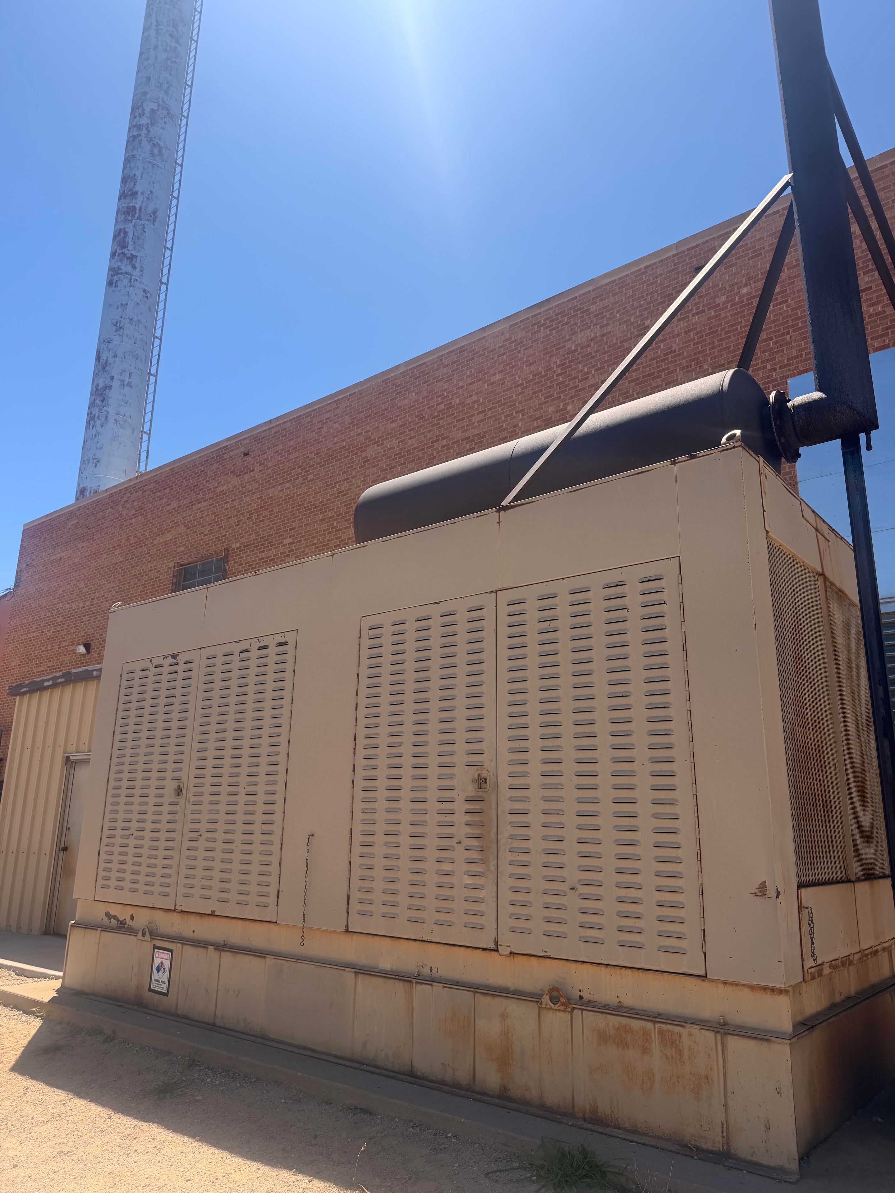 Large outdoor backup generator at institutional facility in Colorado