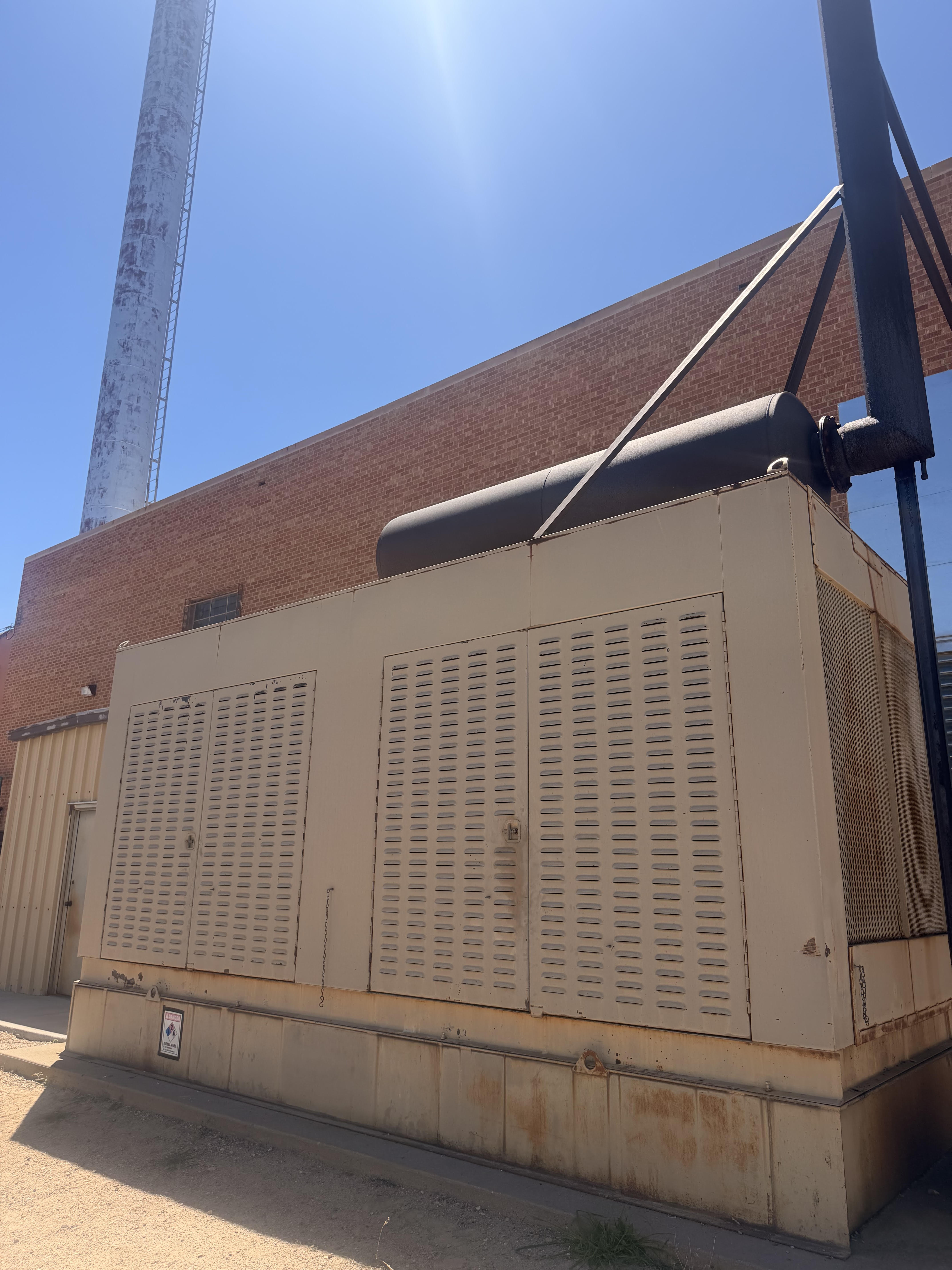 Large outdoor backup generator at institutional facility in Colorado